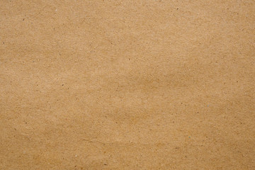 Brown eco recycled kraft paper sheet texture cardboard background