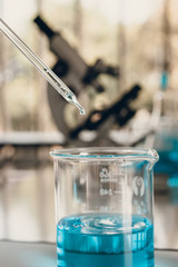 Laboratory Tube With sampling of Virus corona covid 19 vaccine. 
Scientific Lab equipment Close-Up. Concept of Pandemic Disease and Healthcare Vaccine.