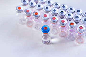 close up on vaccine and medical syringe