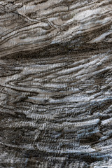Abstract gray texture of natural, raw salt in an underground salt mine