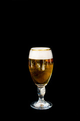 Glass of freshly poured beer