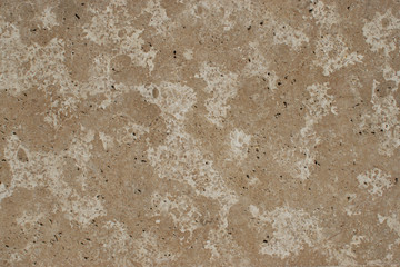 Wall of cement. Background of the old wall. Stucco in the form of marble. Urban architecture