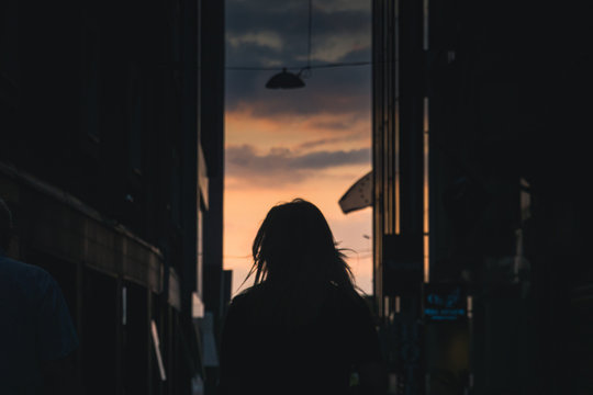 Silhouette of a woman on a street