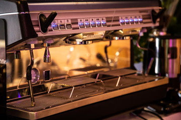empty coffee auto machine in cafe .