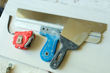 construction spatula on a white background during repair