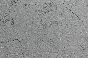 Texture of gray cracked stucco