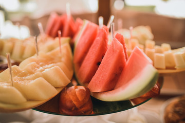 Catering services in restaurant outdoor on wedding ceremony. Food and glass of champagne. restaurant