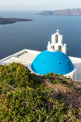 Orthodox church with blue dome on Santorini island, Greece