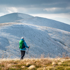 Young woman hiking in the mountains