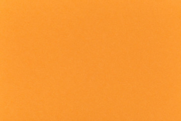 Photo of  orange paper texture, horizontal,  copy space