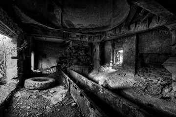 Fototapeta na wymiar Inside a scary old abandoned factory