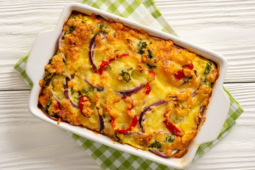 Colorful vegetable casserole with cheese, vegetarian dish.