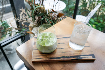 Matcha green tea latte and Drinking water.