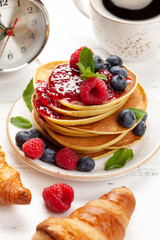 Delicious homemade pancakes with summer berries