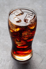 Class of cola with ice cubes
