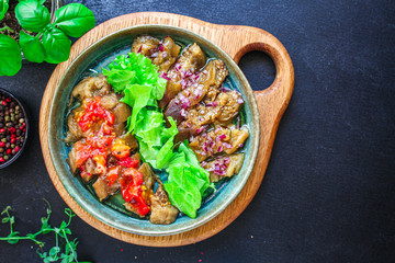 eggplant salad spices and tomatoes, antipasto Menu concept healthy eating. food background top view copy space for text keto or paleo organic product diet
healthy eating