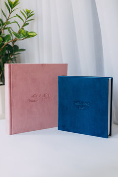 beautiful wedding photo book, book cover made of velor, different size, color blue and pink