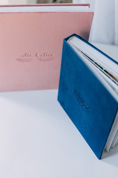 beautiful wedding photo book, book cover made of velor, different size, color blue and pink