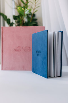 beautiful wedding photo book, book cover made of velor, different size, color blue and pink