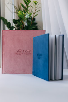 beautiful wedding photo book, book cover made of velor, different size, color blue and pink