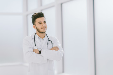 portrait of a physician therapist on a light background