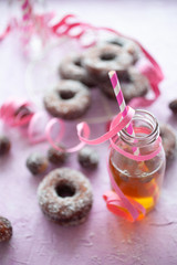 Sugar donuts on pink background - 345560511