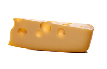 Maasdam cheese with large holes isolated on white