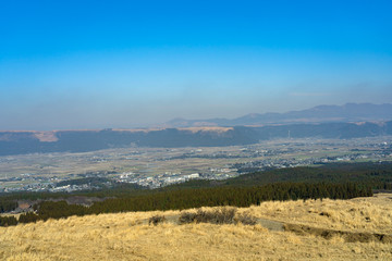 Overlooking the city of Aso on the Mount Aso. Aso Kuju National Park, Kumamoto Prefecture, Japan