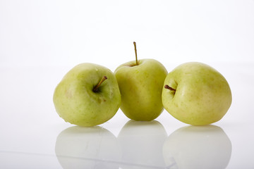 Fresh juicy fruit green apple on white background natural organic delicious nutritious healthy food vegetarian freshness diet vegan.