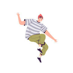 Fototapeta na wymiar Young happy man in a red hat, striped t-shirt and green jeans cheerfully jumps and laughs