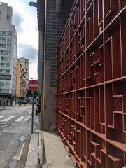 red steel pattern behind a Chinese temple