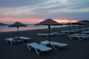 Sunset on the Calis Beach on the Aegean Sea