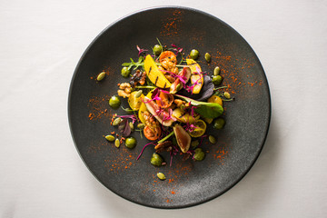 Tropical Salad on Black Plate