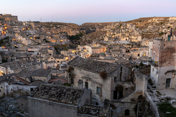 Naklejka premium View of the Sassi di Matera a historic district in the city of Matera, well-known for their ancient cave dwellings. Basilicata. Italy
