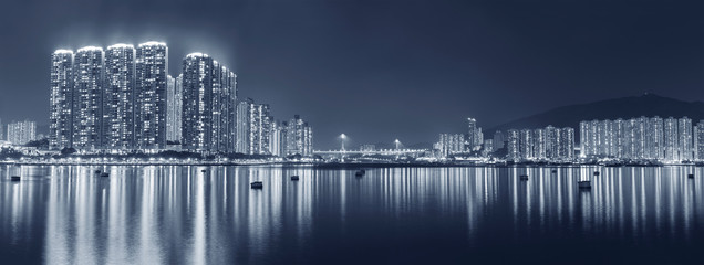 Panorama of harbor of Hong Kong city at night