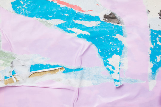 Pink torn and crumpled paper poster. Old dirty ripped and peeling grunge paper placards texture background.