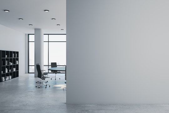 Luxury meeting room with blank gray wall.