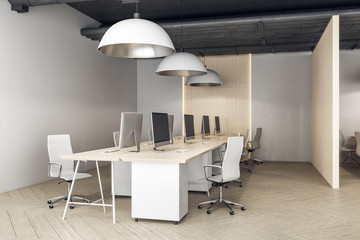 Modern coworking office interior with computers