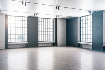 Contemporary loft gallery interior with windows to city