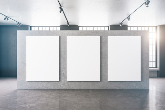 Three Blank Big Mock Up Poster On Wall