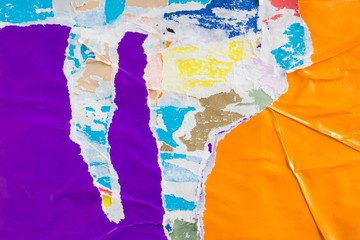 Purple and orange torn and crumpled pieces of paper poster. Old dirty ripped and peeling grunge...