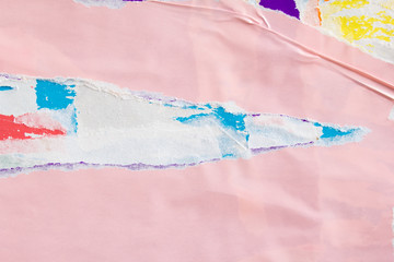 Pink torn and crumpled piece of paper poster. Old dirty ripped and peeling grunge paper placards...