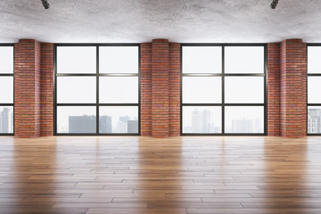 Contemporary red brick room with panoramic city view.