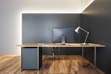 Minimalistic workspace desktop with computer and lamp