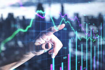 Businessman hand using recession stock chart