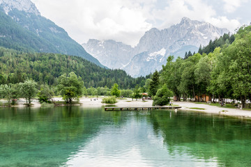 Lake Jasna in Slovenia with mountains in the background
