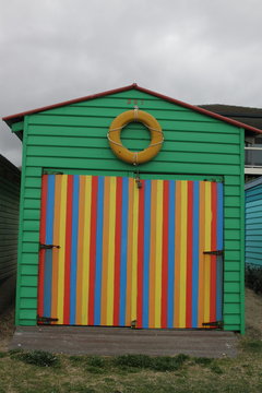 Multi Colored Beach Hut Against Sky