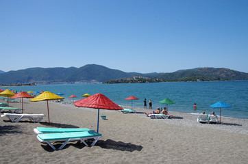 FETHIYE, TURKEY - June, 2019: Calis Beach on the Aegean Sea
