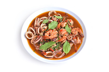 Traditional Thai flavor spicy food on white background, Pad ka prao is a famous food of Thailand people.