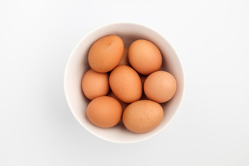 Fresh eggs on white background